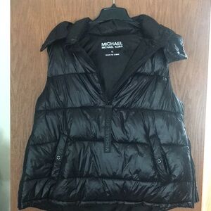 Michael Kors NWT Shiny Black Puffer Vest With Zippers and Pockets that zip.